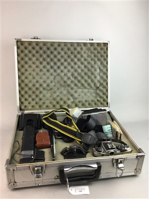 Lot 108 - A NIKON CAMERA WITH FOUR LENSES, LIGHT METER, FLASH, FILTERS AND CARRY CASE