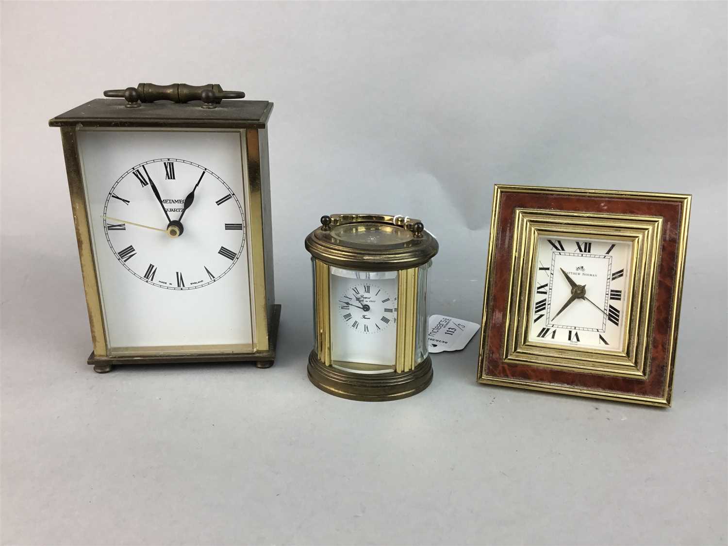 Lot 113 - A BRASS CARRIAGE CLOCK WITH TWO OTHER TIMEPIECES
