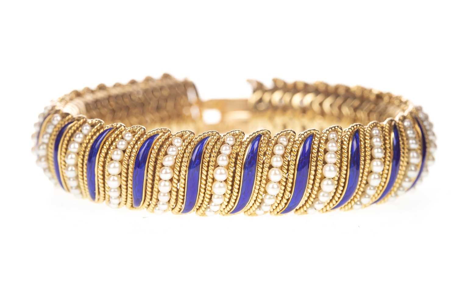 Lot 162 - A GARRARD AND CO. GOLD ENAMEL AND PEARL BRACELET