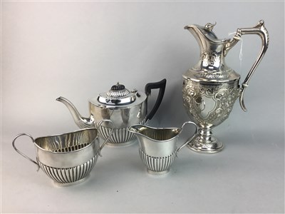 Lot 209 - A SILVER PLATED THREE PIECE TEA SERVICE AND A EWER