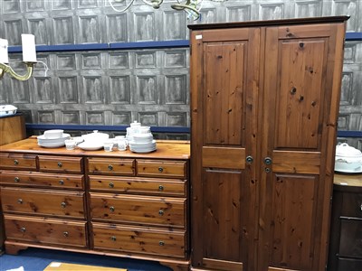 Lot 348 - A PINE TWO DOOR WARDROBE AND A LARGE CHEST OF DRAWERS