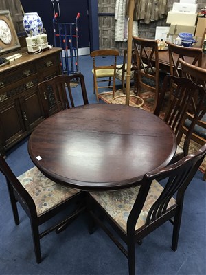 Lot 299 - A MAHOGANY DINING TABLE AND FOUR CHAIRS