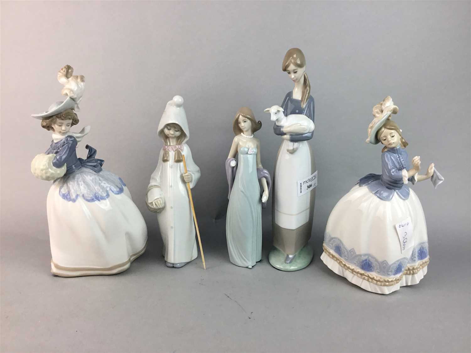 Lot 306 - A LOT OF FIVE LLADRO AND NAO FIGURES