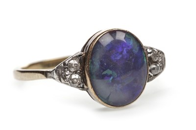 Lot 31 - AN OPAL AND DIAMOND RING