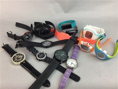 Lot 244 - A LOT OF DIGITAL WATCHES AND EXERCISE WRISTBANDS