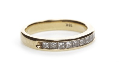 Lot 1125 - A DIAMOND HALF ETERNITY RING