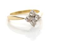 Lot 3 - DIAMOND CLUSTER RING of floral form, set with...