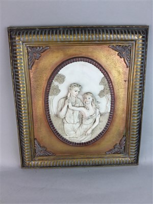 Lot 406 - A SET OF THREE FRAMED WALL PLAQUES
