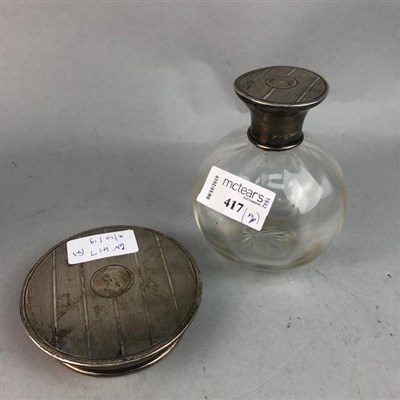 Lot 417 - A SILVER TOPPED PERFUME BOTTLE AND A JAR COVER