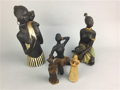 Lot 56 - A ROYAL CROWN DERBY PLATE, THREE AFRICAN FIGURES OF LADIES AND TWO OTHER FIGURES