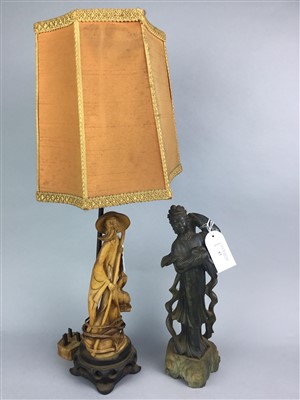 Lot 57 - A CHINESE SOAPSTONE FIGURE, A FIGURAL LAMP AND ANOTHER FIGURE