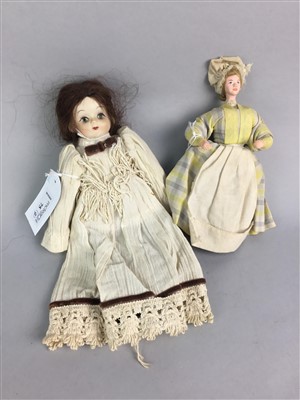 Lot 75 - A SMALL BISQUE HEADED DOLL, ANOTHER DOLL, AN EVENING PURSE AND A 'MARLEY' HORSE