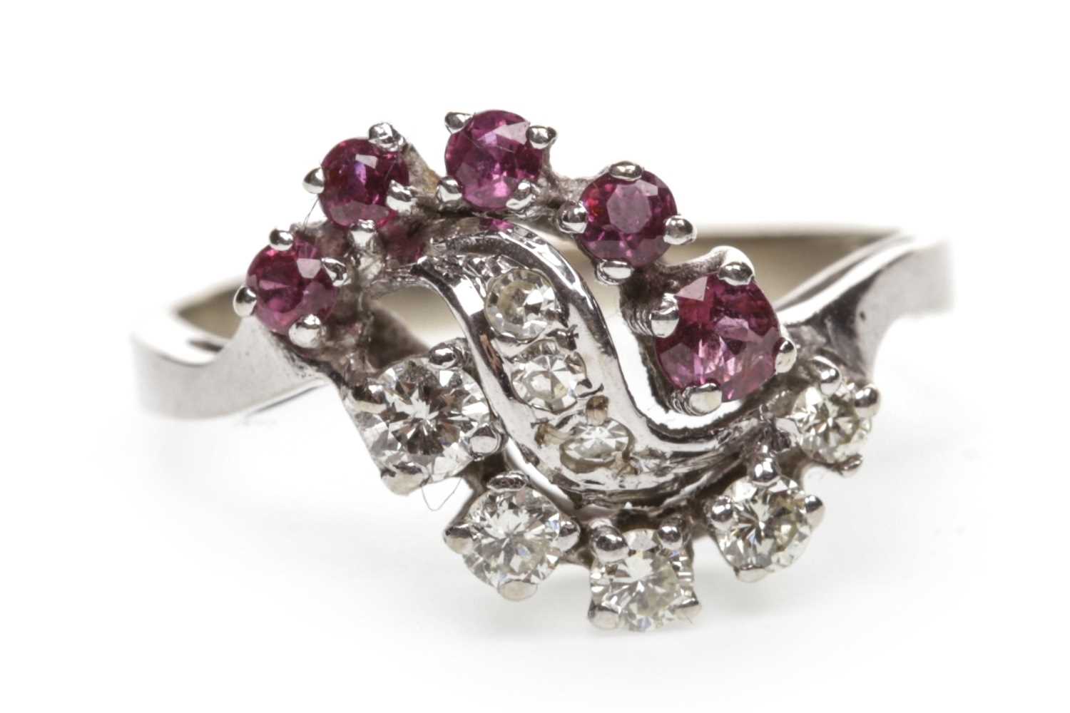 Lot 48 - A RED GEM SET AND DIAMOND RING