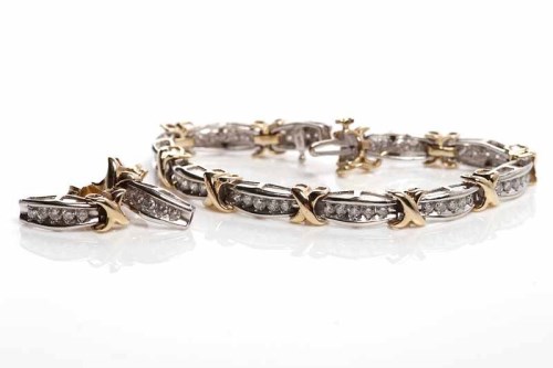 Lot 40 - DIAMOND BRACELET WITH MATCHING EARRINGS the...