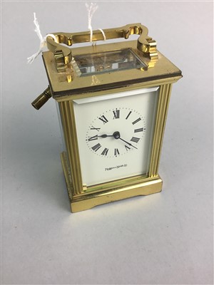 Lot 111 - A BRASS AND FIVE GLASS CARRIAGE CLOCK