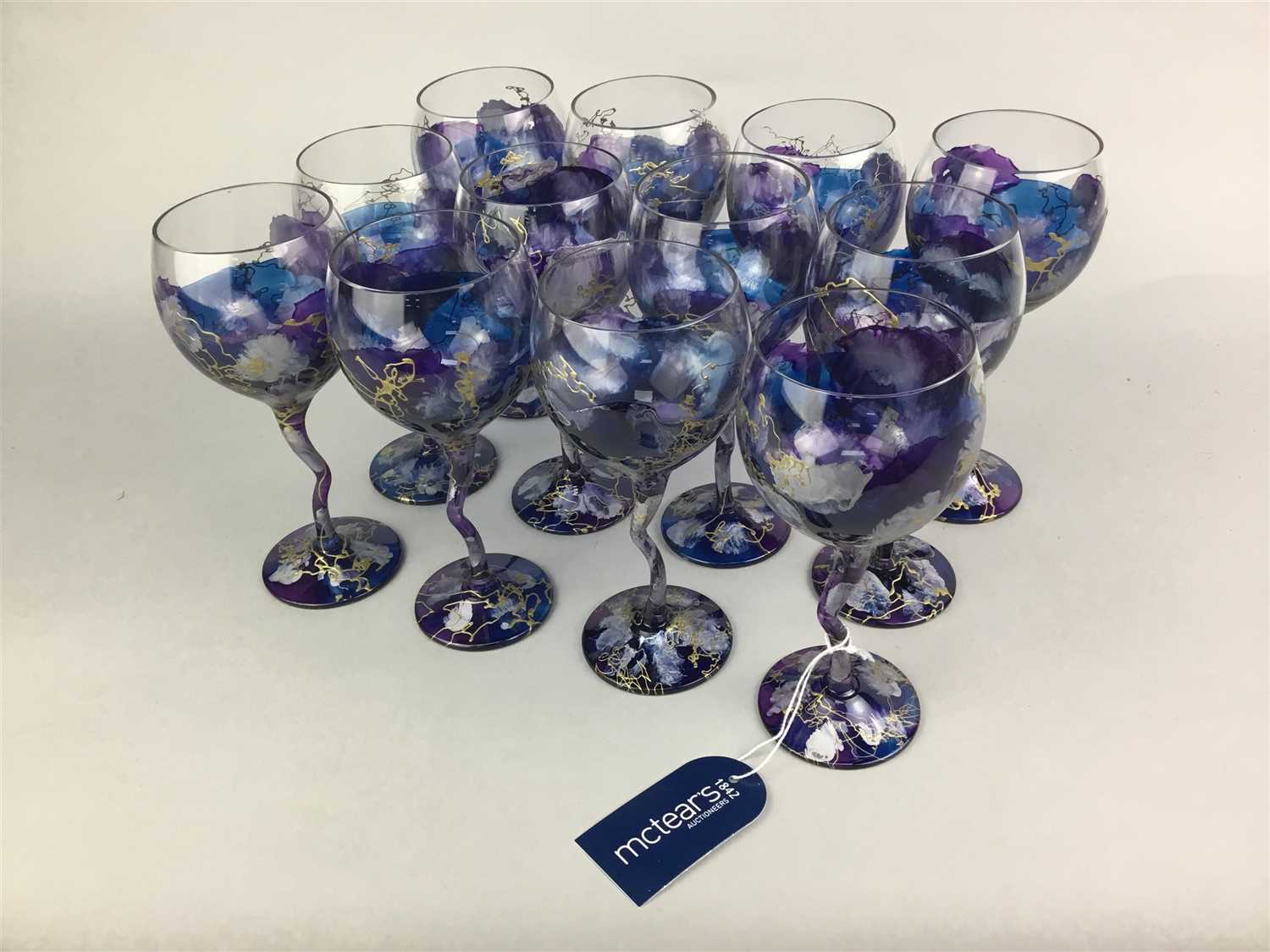 Lot 115 - A SET OF TWELVE COLOURED WINE GLASSES AND OTHER GLASSES