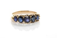 Lot 49 - LATE VICTORIAN SAPPHIRE FIVE STONE RING set...