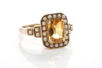 Lot 51 - CITRINE AND SPLIT PEARL RING the central...