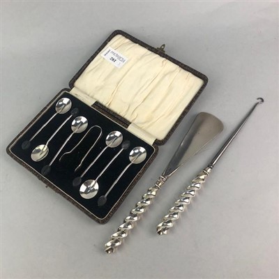 Lot 281 - A SET OF SIX SILVER COFFEE SPOONS AND TONGS,  A SILVER HANDLED SHOE HORN AND A BUTTON HOOK