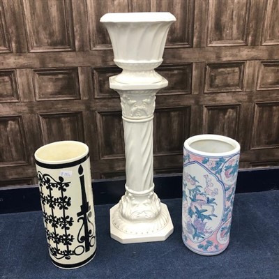 Lot 285 - A CERAMIC JARDINIERE ON STAND AND TWO CERAMIC STICK STANDS