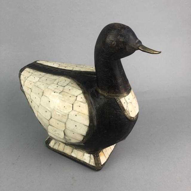 Lot 288 - A STAINED WOOD FIGURE OF A DUCK AND THREE COMPOSITE WALL HANGINGS