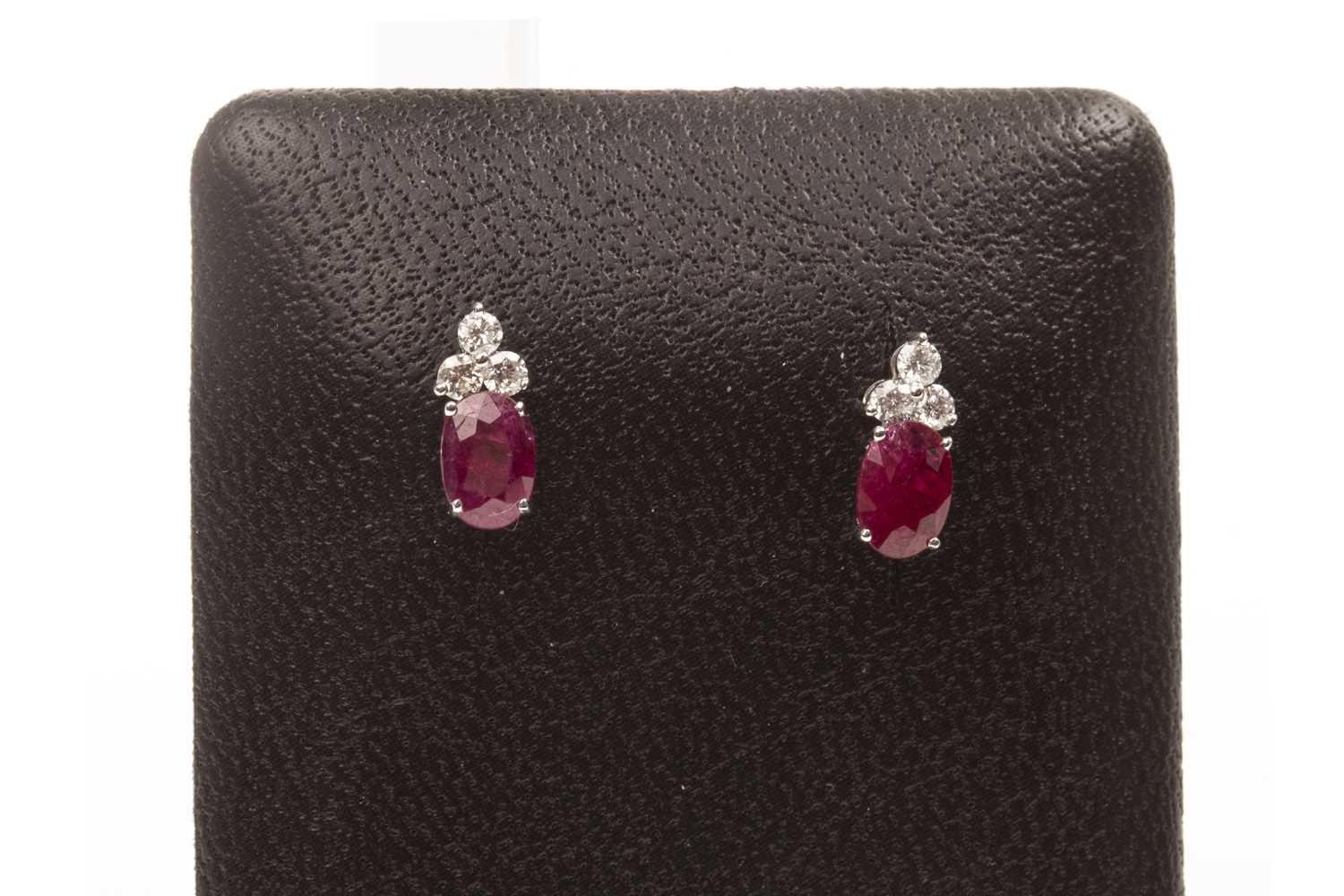 Lot 74 - A PAIR OF RUBY AND DIAMOND EARRINGS