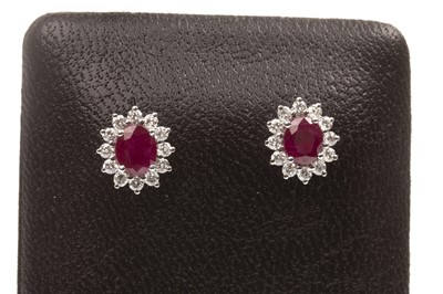 Lot 81 - A PAIR OF RUBY AND DIAMOND EARRINGS