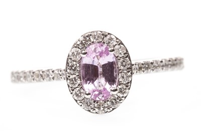 Lot 283 - A PINK SAPPHIRE AND DIAMOND RING