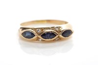 Lot 67 - SAPPHIRE AND DIAMOND RING with marquise cut...