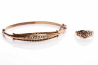 Lot 69 - VICTORIAN GOLD BANGLE with an elliptical...