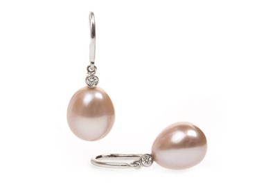 Lot 143 - A PAIR OF PEARL AND DIAMOND EARRINGS