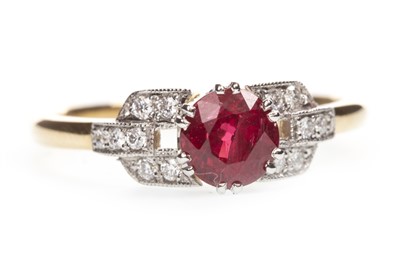 Lot 145 - A RED GEM SET AND DIAMOND RING