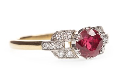 Lot 145 - A RED GEM SET AND DIAMOND RING