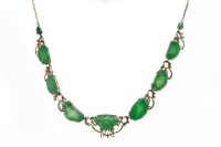 Lot 80 - JADEITE NECKLACE set with carved sections of...