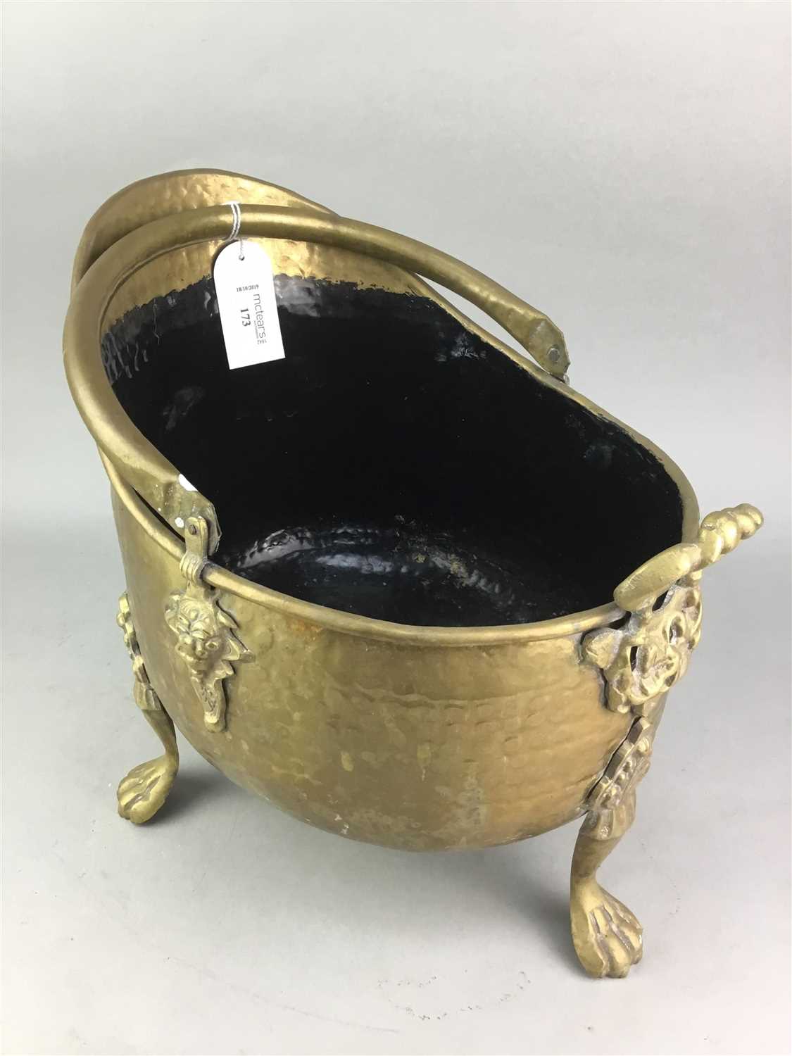 Lot 173 - A BRASS COAL SCUTTLE AND A PAIR OF CANDLESTICKS