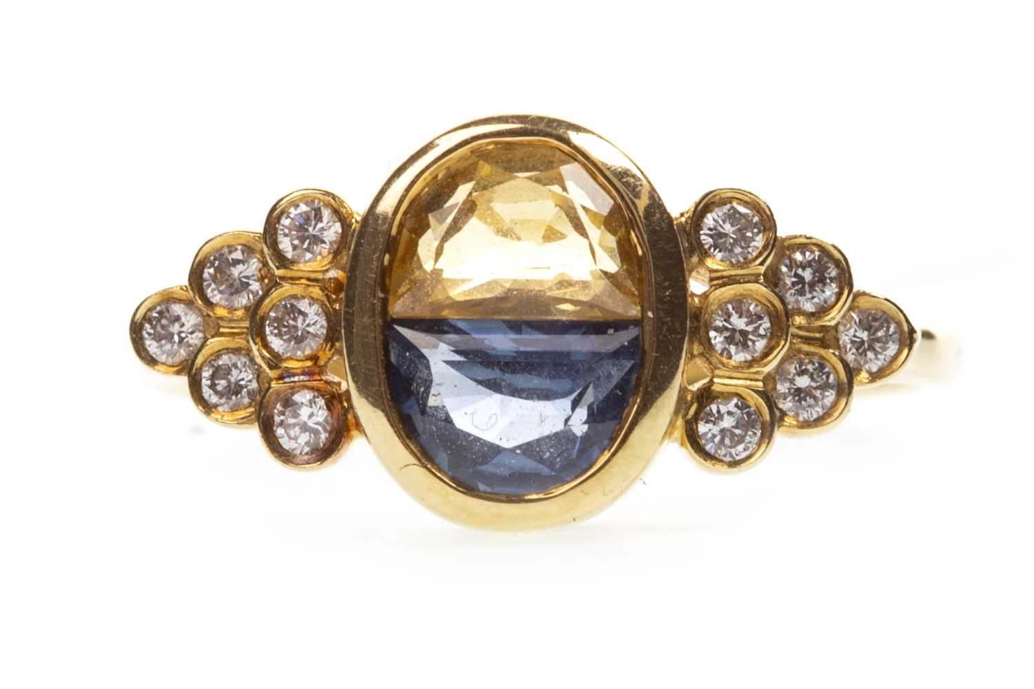 Lot 162 - A BLUE AND YELLOW GEM SET AND DIAMOND RING