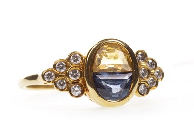 Lot 162 - A BLUE AND YELLOW GEM SET AND DIAMOND RING