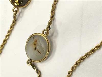 Lot 165 - A GEM SET NECKLACE AND RING