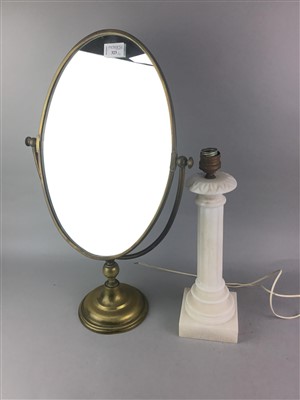Lot 323 - A BRASS OVAL DRESSING GLASS, BRASS DOOR KNOCKER, TABLE LAMP AND A HARDWOOD STAND