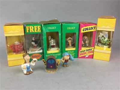 Lot 259 - A LOT OF TWO CAT MODEL VEHICLES AND A COLLECTION OF TETLEY TEAFOLK