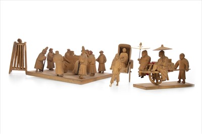 Lot 1042 - A CHINESE CARVED WOOD DIORAMA OF A COURTROOM SCENE AND OTHER CARVINGS