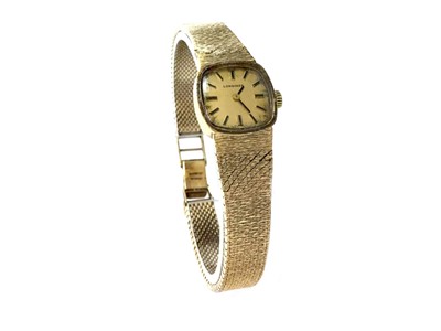 Lot 810 - A LADY'S GOLD LONGINES WATCH