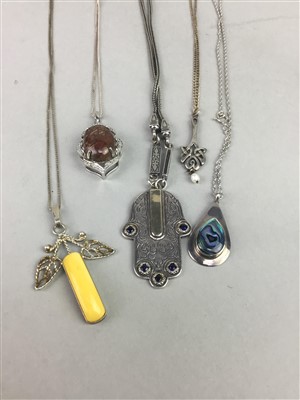 Lot 7 - A LOT OF TEN VINTAGE SILVER PENDANTS AND CHAINS