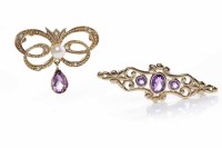Lot 120 - TWO AMETHYST SET BROOCHES one in the art...