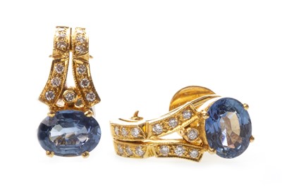 Lot 15 - A PAIR OF BLUE GEM AND DIAMOND EARRINGS