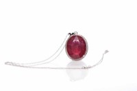 Lot 124 - LARGE RUBY PENDANT the oval ruby of...