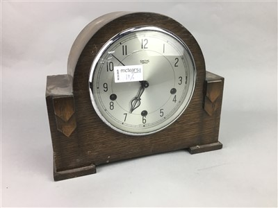 Lot 19 - A SIGNALLING DEVICE AND TWO MANTEL CLOCKS