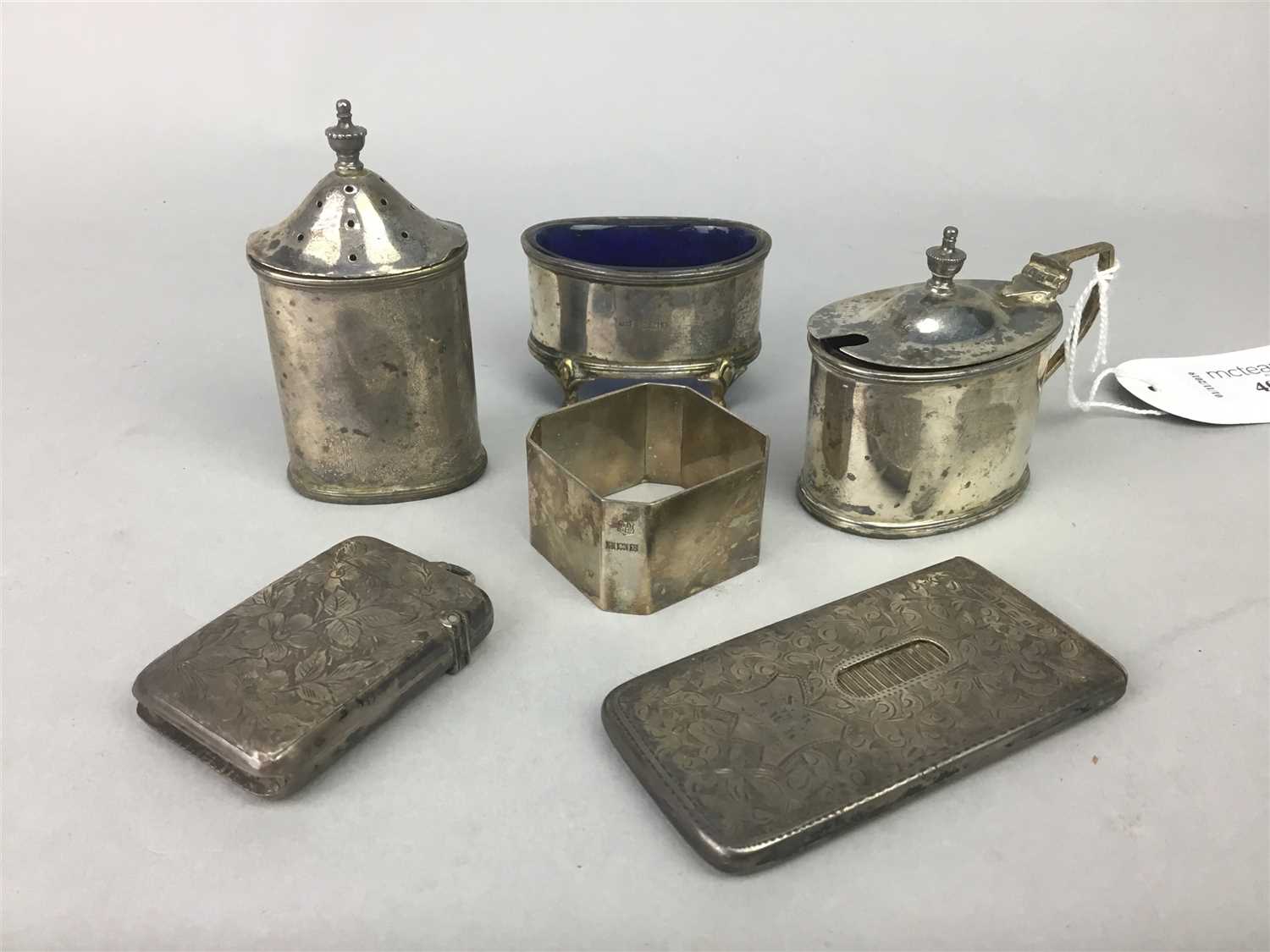 Lot 40 - A SILVER CONDIMENT SET AND TWO VESTA CASES