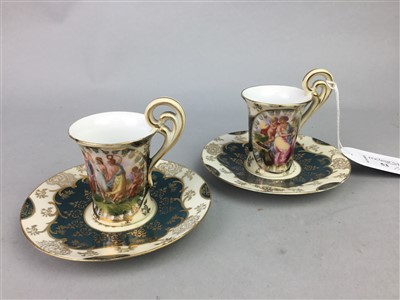 Lot 53 - A STAFFORDSHIRE COFFEE SERVICE ALONG WITH TWO CUPS AND SAUCERS AND A PAIR OF CHERUBS