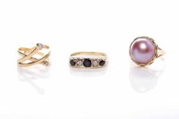 Lot 133 - GROUP OF THREE GOLD RINGS comprising a pearl...